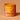 We see a orange packshot of She's the Bomb's Energy Balance Bomb, with on the Inside a 250 gram Vanilla and Citrus Bath Bomb.